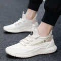 Men's white low-top casual sports shoes with mesh upper and rubber sole on a plain background.