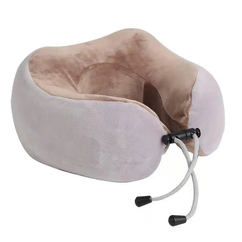 Brown U-shaped electric neck massager pillow on a grey background