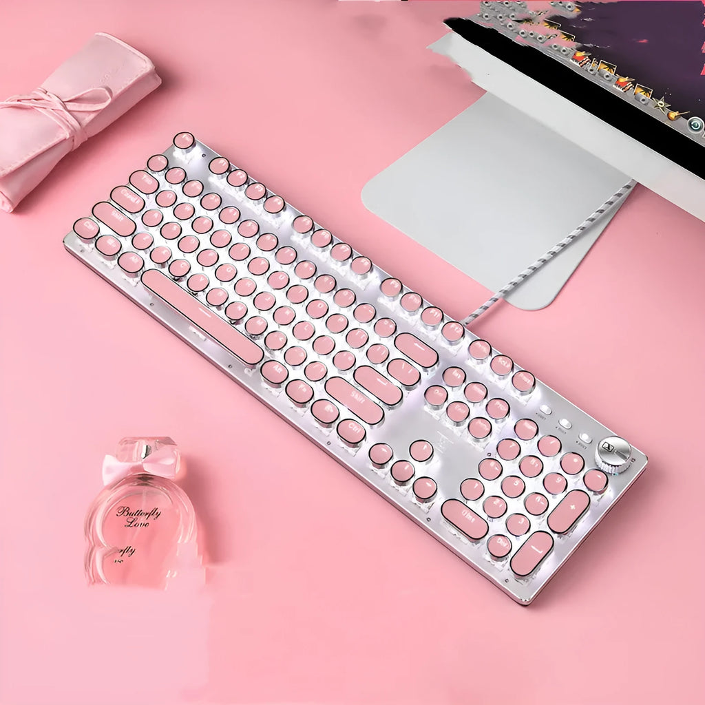 Silver and pink mechanical keyboard with white backlighting and green switches