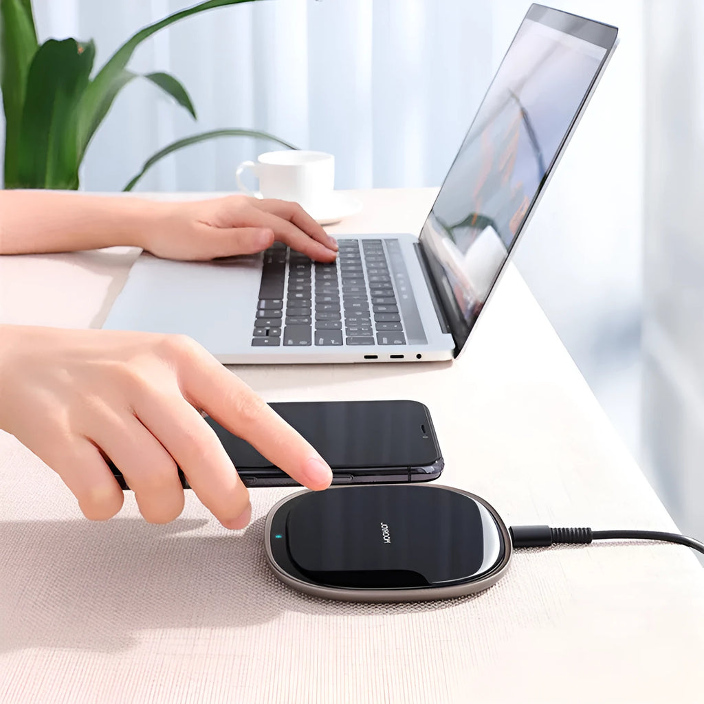 Black 15W wireless phone charger with glass surface and zinc alloy base