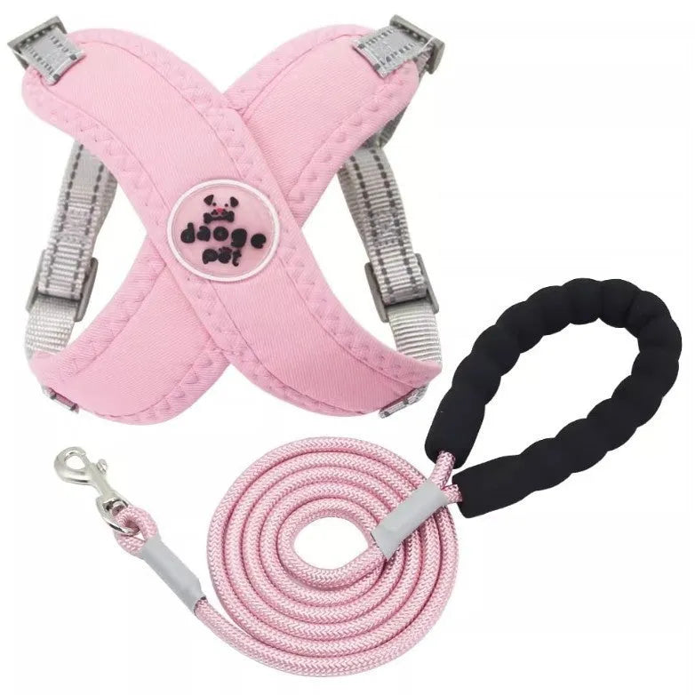 A colourful dog walking vest harness with an attached lead rope, shown in blue, green, pink, or yellow.
