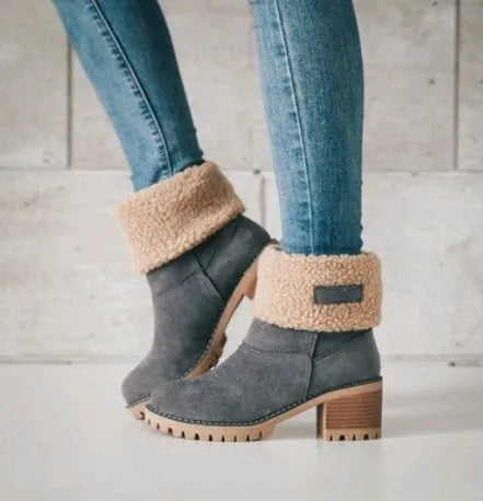 Women's mid-calf suede snow boots in various colours with a thick flat heel and round toe.