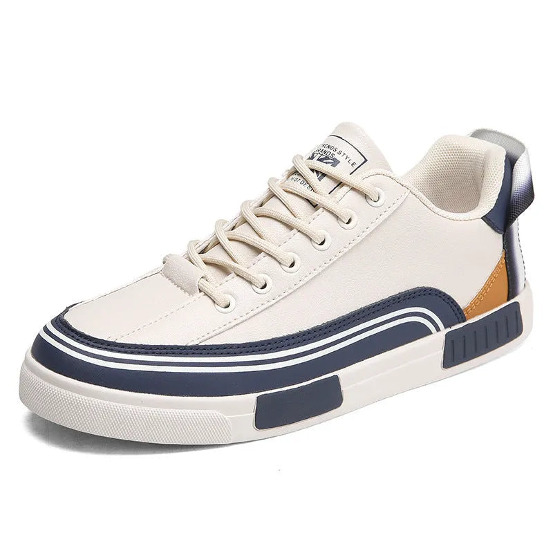 Men's beige and white and green canvas casual shoes with mesh sections and a round toe.