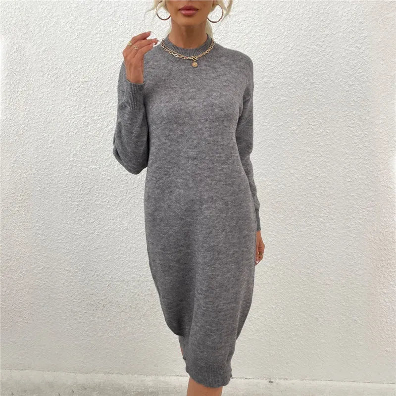 Grey crew neck sweater dress with long sleeves on mannequin showing pullover style