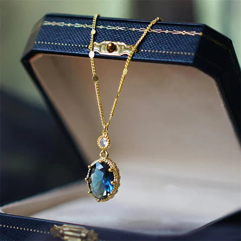Gold electroplated copper geometric necklace with French retro styling