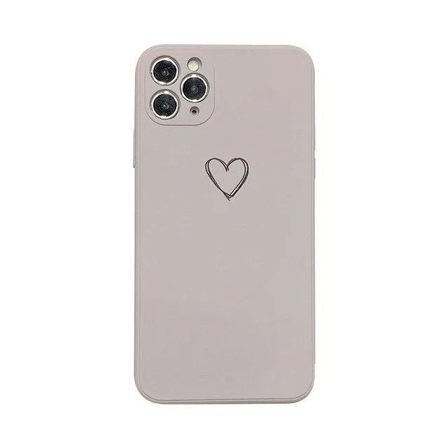 Solid colour silicone TPU back cover case for Apple iPhone on a table.