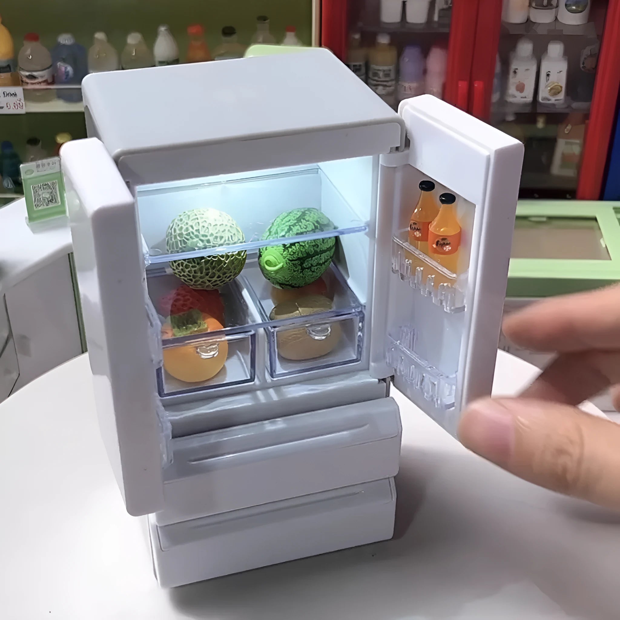 White plastic miniature candy toy model with light-up feature for display collections
