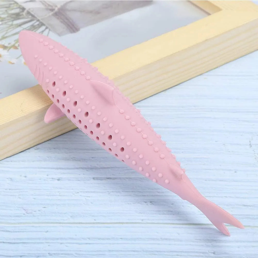 Green silicone fish-shaped chew toy for cats on a white background, showing side air holes.