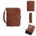 Women's black PU leather zipper coin purse with integrated card wallet showing secure closure