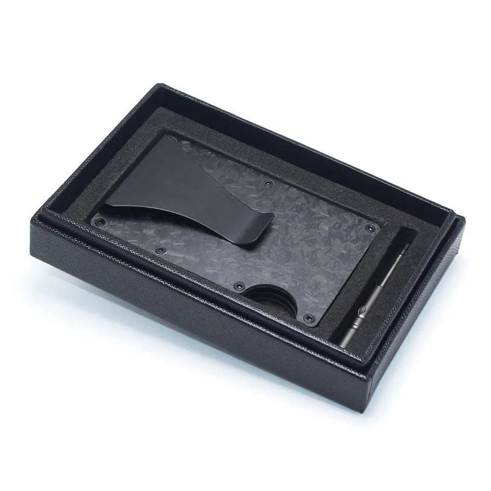 Geometric carbon fibre and aluminium card holder for bank cards and notes, 8mm thick.