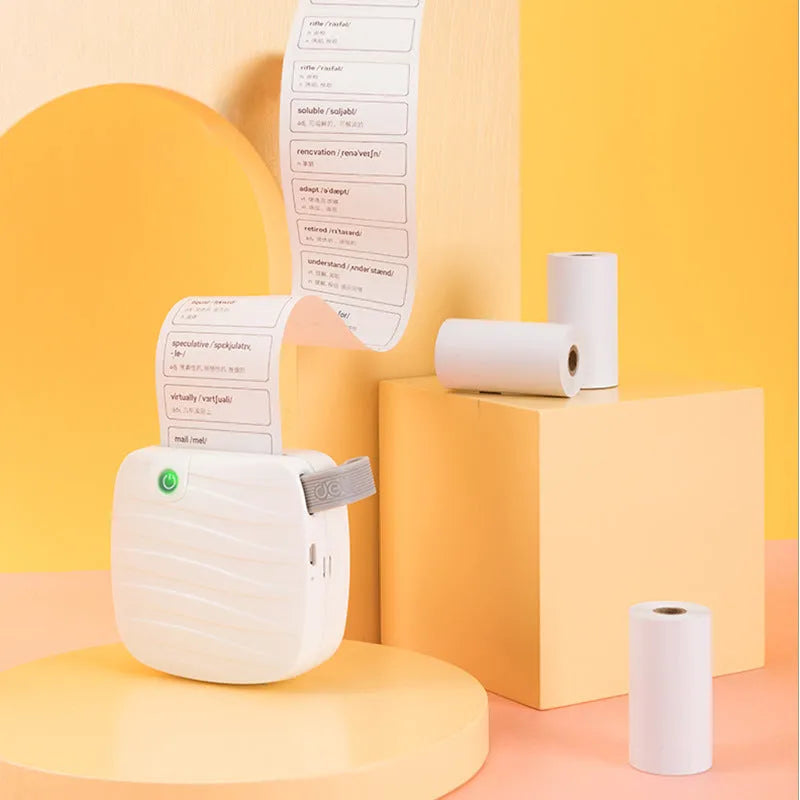 Three rolls of 57mm wide thermal paper with 30mm diameter in packaging