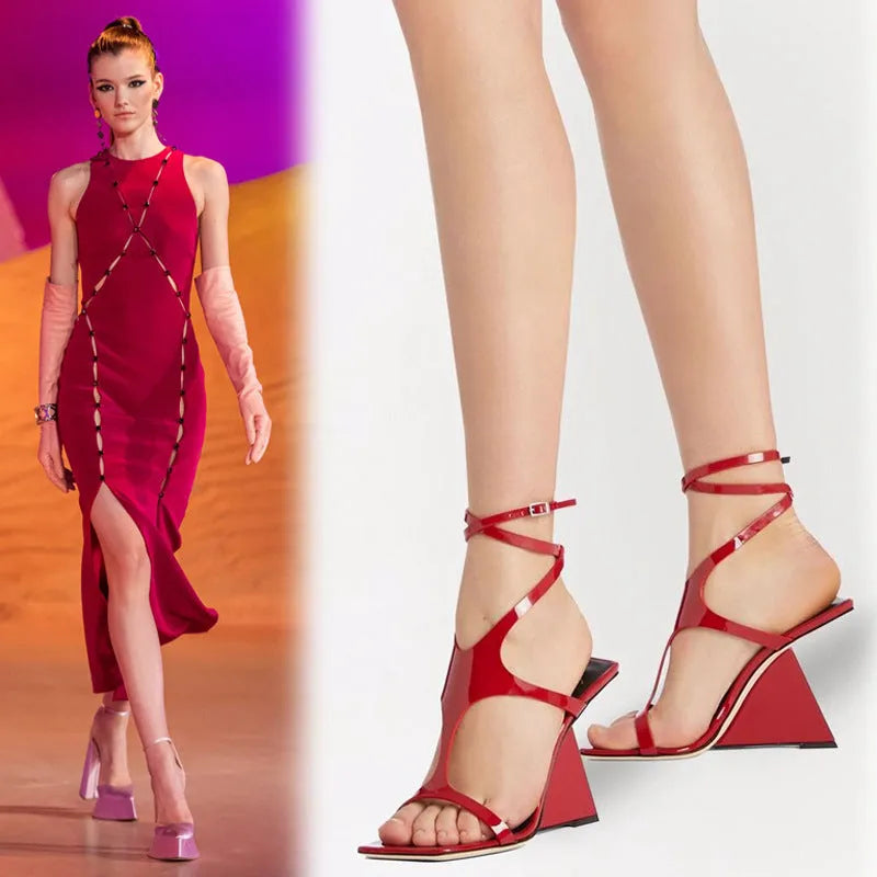 Women's black high heel sandals with 9.5cm heel and button fastening on a square toe.
