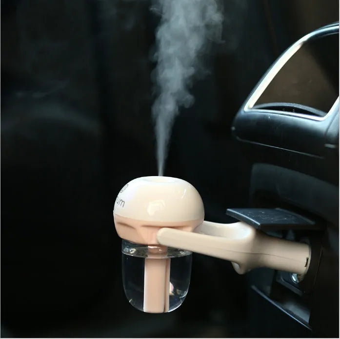 Portable car humidifier air purifier freshener with essential oil diffuser in compact travel design