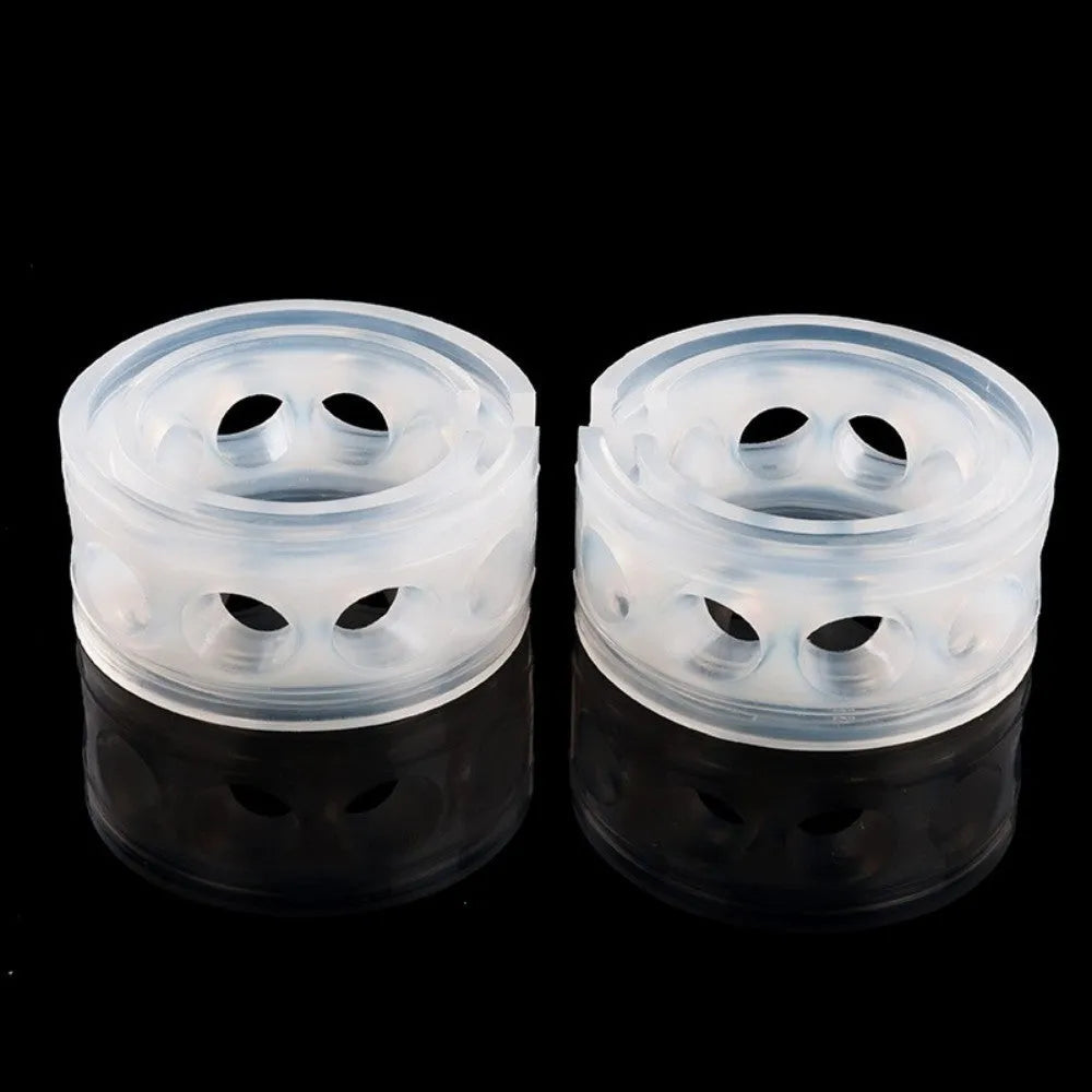 Transparent rubber shock absorber buffer for car suspension springs, shown in multiple sizes.
