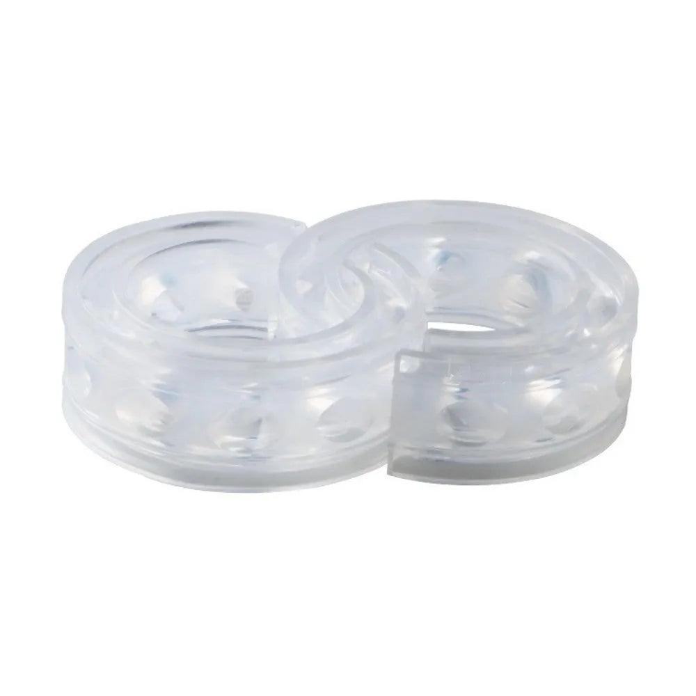 Transparent rubber shock absorber buffer for car suspension springs, shown in multiple sizes.