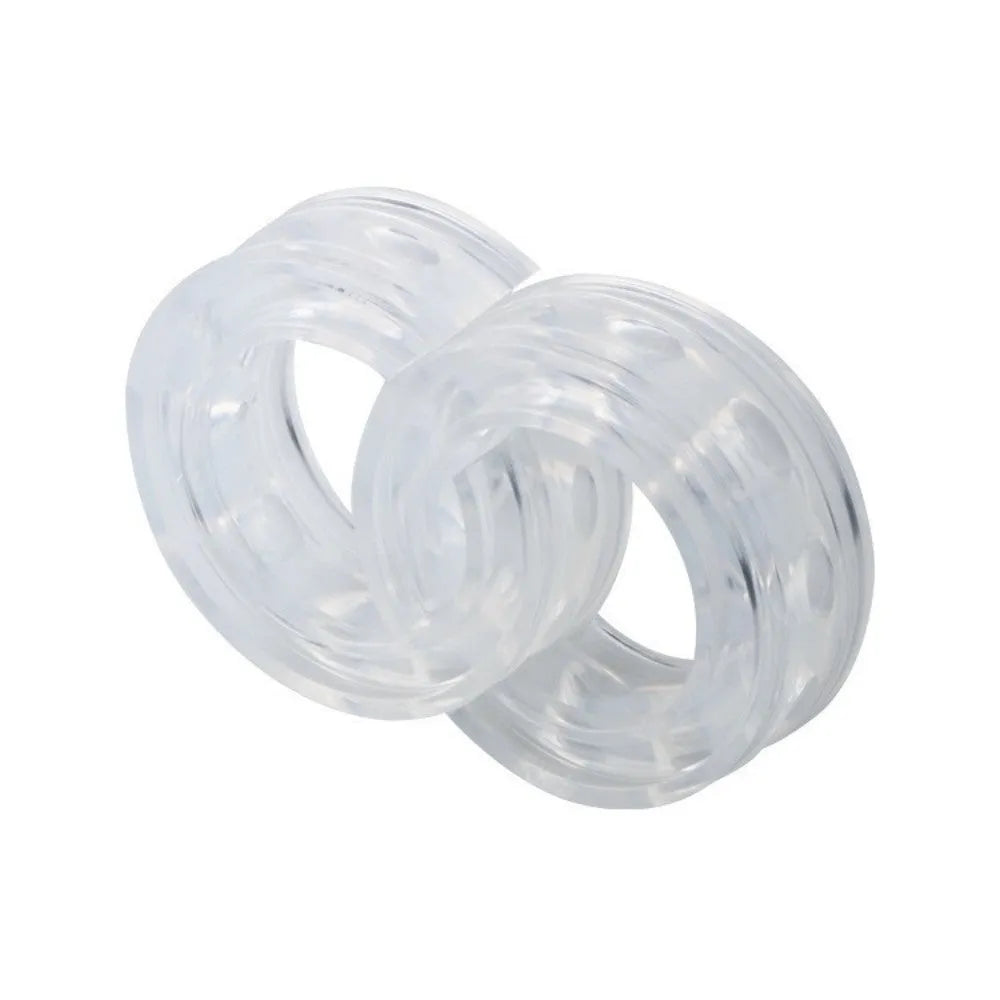 Transparent rubber shock absorber buffer for car suspension springs, shown in multiple sizes.