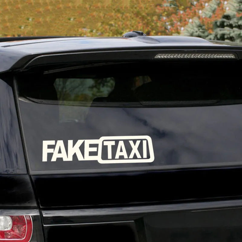 FAKE TAXI car warning sticker in yellow, black, and white colour options, shown at 20cm by 8cm size.