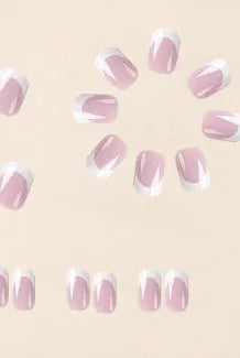 White plaid pattern artificial nail tips set with 24 pieces in an open box.