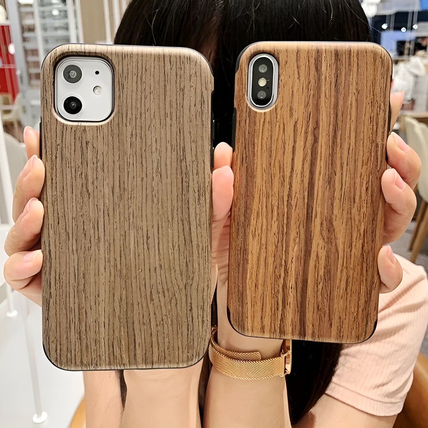 Wooden iPhone case showing rosewood, teak, and walnut finish options on compatible iPhone models