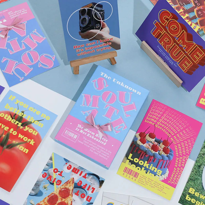 Box containing two printed postcards with fresh artwork designs for greetings and simple gifts.