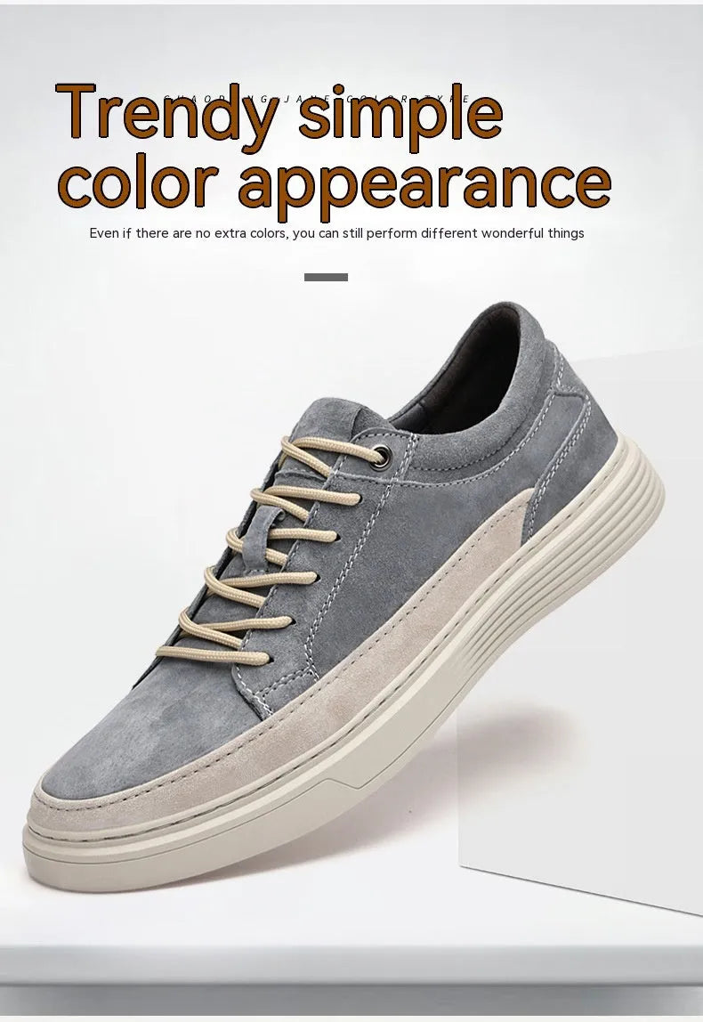 Men's grey low-top casual leather skate shoes with a round toe and flat rubber sole.
