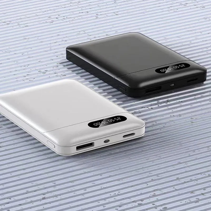 Black or white 10000mAh portable power bank with multiple USB charging ports