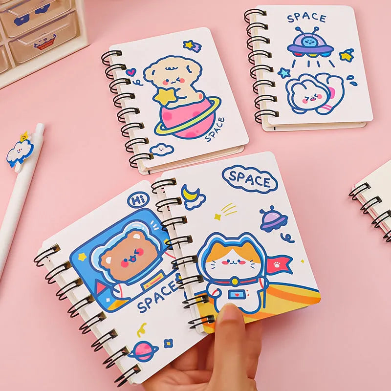 Astronaut themed portable pocket notebook showing soft cover design options and compact 10.5x8cm size
