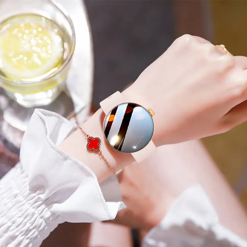 Women's smart watch with circular colour screen and metal strap on wrist