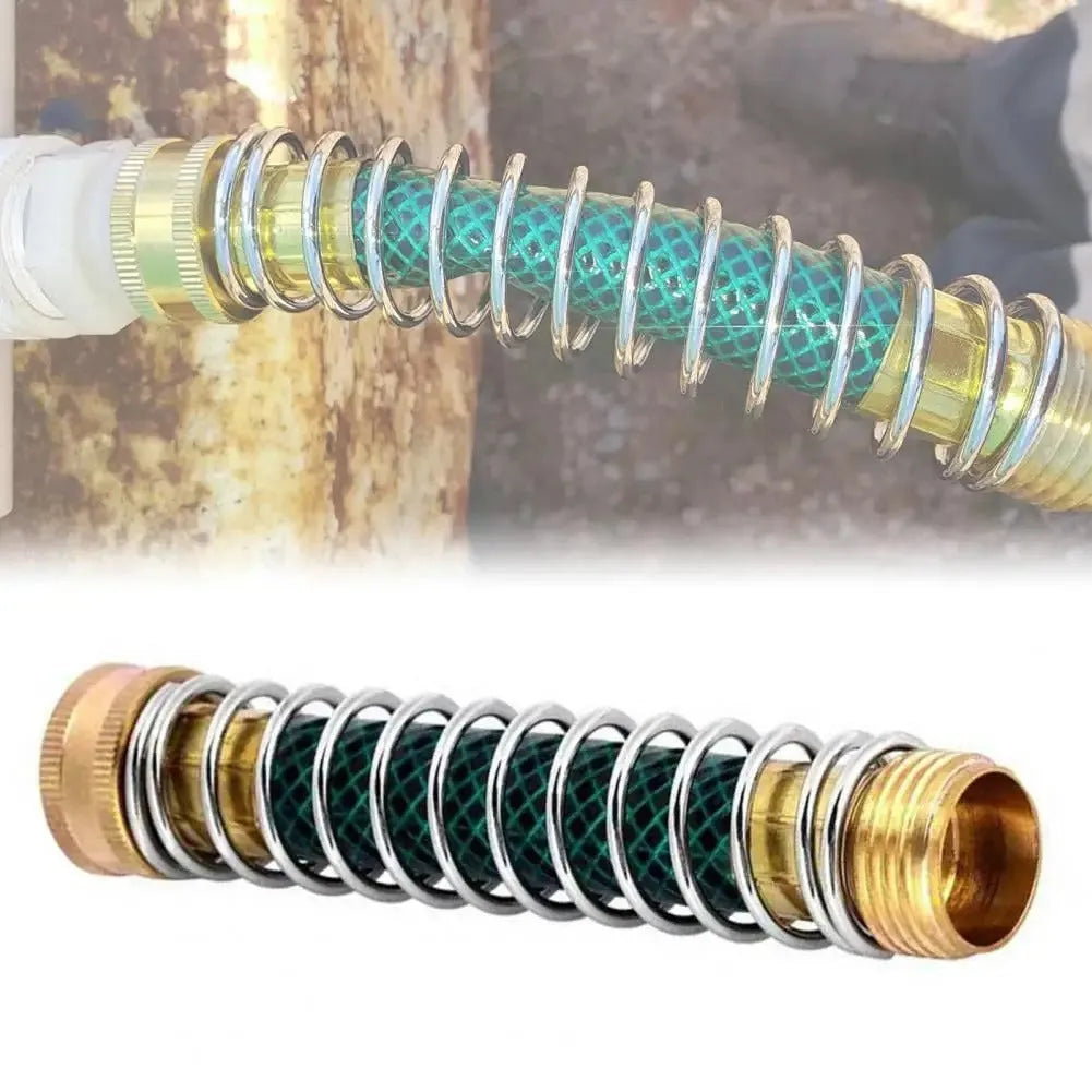 Brass garden hose connector with a coiled spring and 3/4 inch threaded ends on a white background.