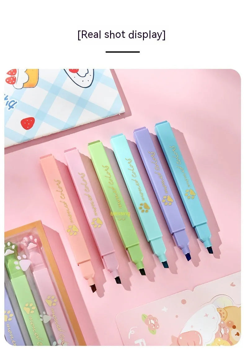 Box of six Cat's Paw fluorescent marking pens with oblique head tips in assorted colours.