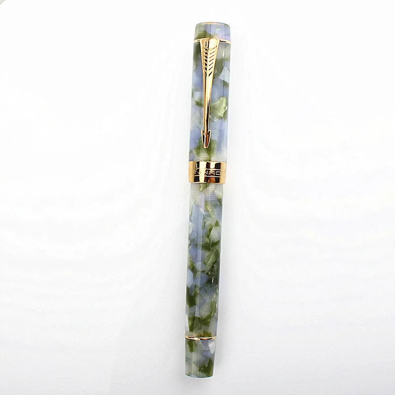 Deep bath green metal ballpoint pen with cap and clip, shown on a neutral background
