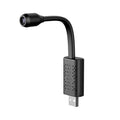 Black V380 wireless USB security camera showing compact design with microSD card slot