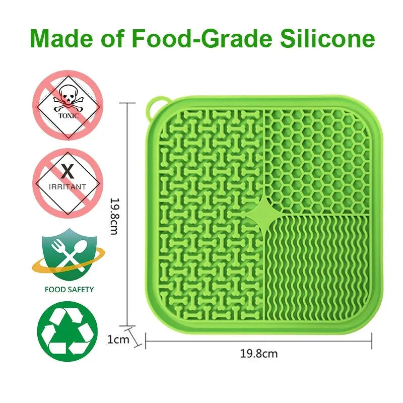 Blue silicone dog licking mat with textured surface and suction cups on back