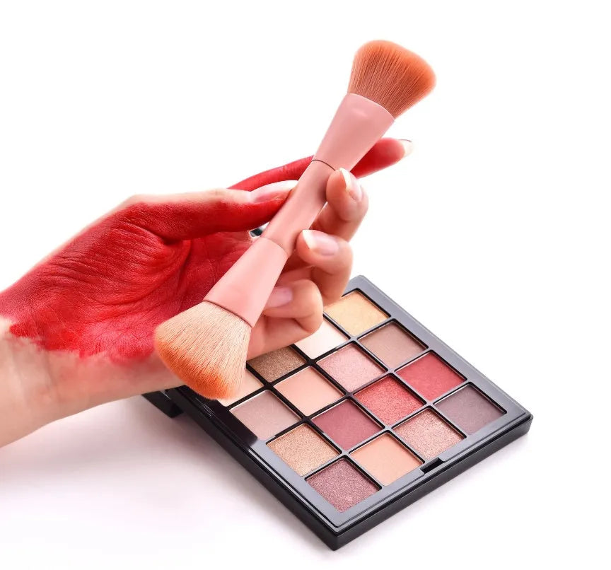 Ten makeup brushes with wooden handles including powder, foundation, and detail brushes for complete face application