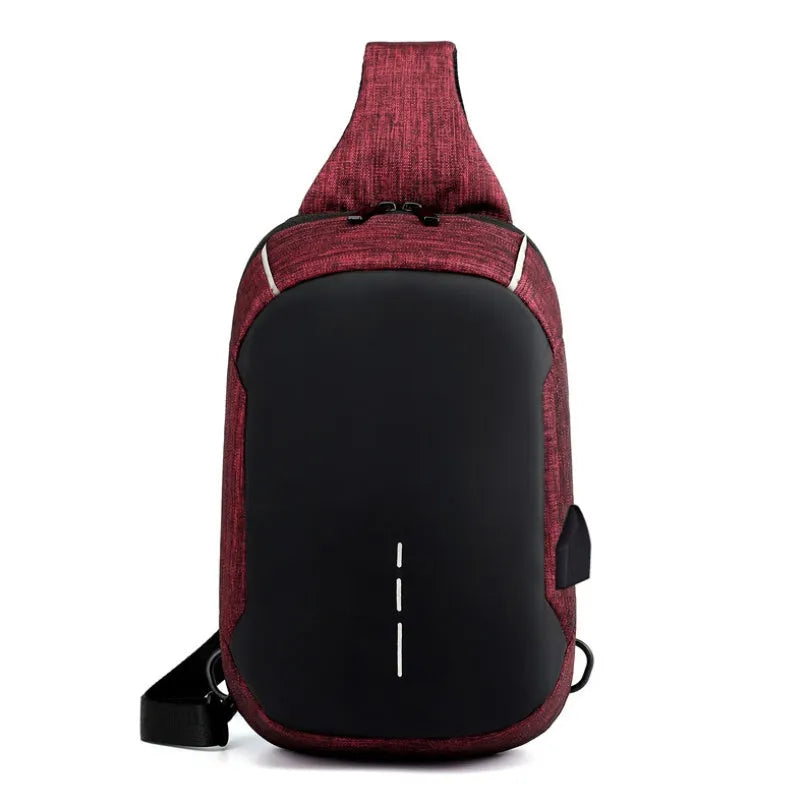 Small dark blue oxford cloth waterproof chest bag with a single strap, shown with the zipper open.