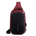 Small dark blue oxford cloth waterproof chest bag with a single strap, shown with the zipper open.