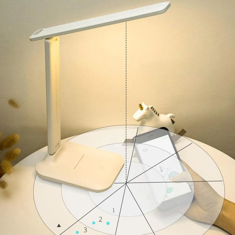 White plastic bedside lamp with touch controls and USB charging port