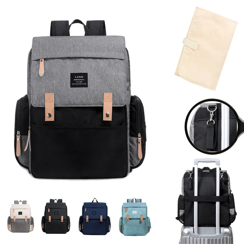 LAND Mommy Diaper Backpack in oxford cloth with changing mat, shown in grey colour.