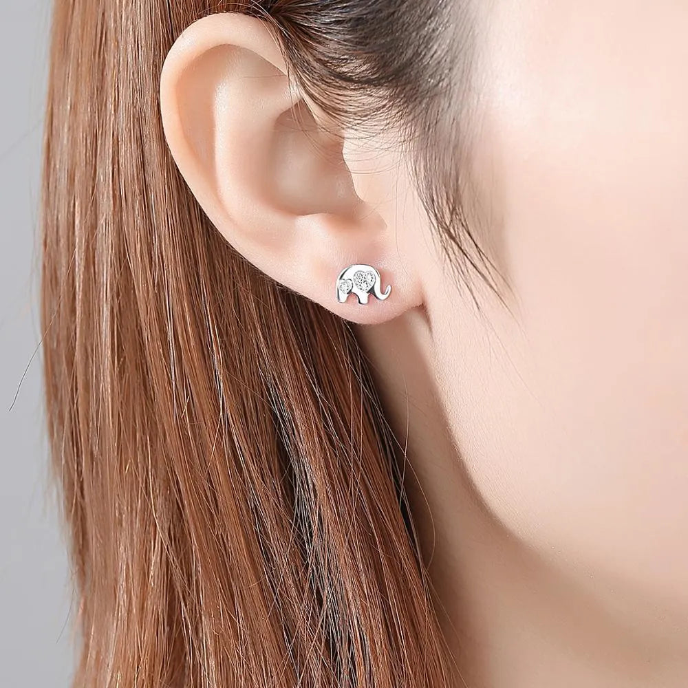 Geometric Korean silver earrings with gem setting, gold finish, 0.6x0.9cm size on a white background