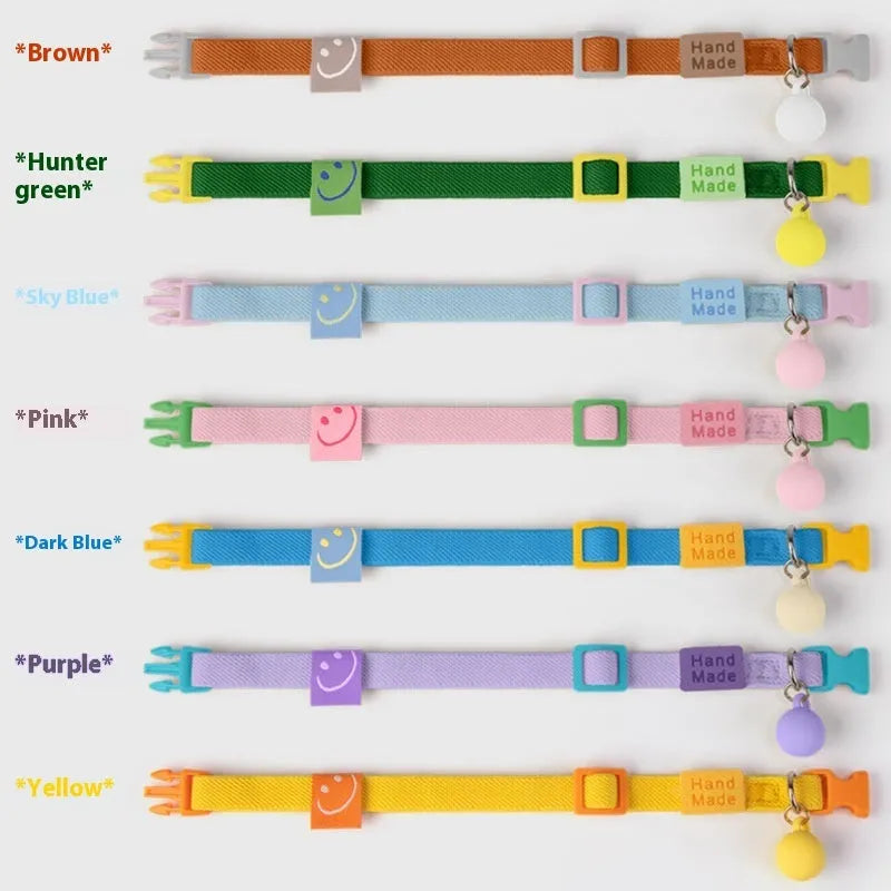 Small dog collar in polyester with high elasticity adjustment between 22-32cm showing seven colour options