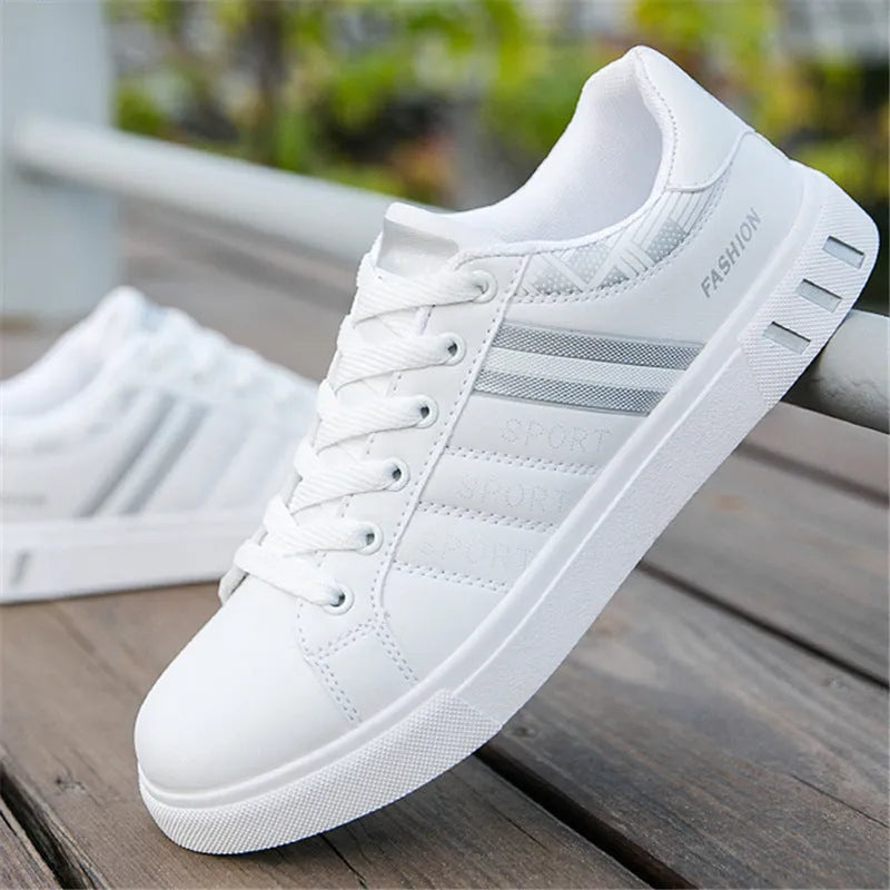 Black sports shoes on a size chart showing EU sizes 39 to 44 and corresponding foot length measurements.