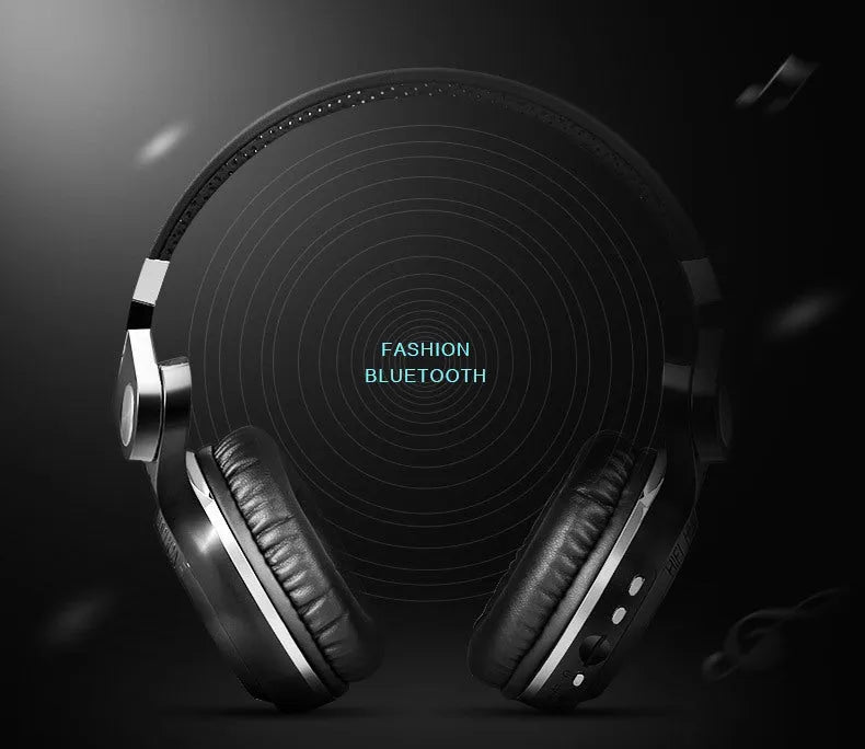 Black wireless Bluetooth over-ear headphones with a subwoofer on a white background.
