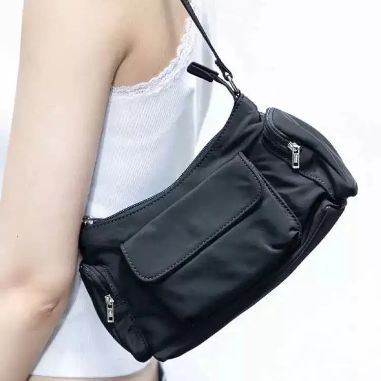 Black nylon women's shoulder bag with double pockets and side-line detailing