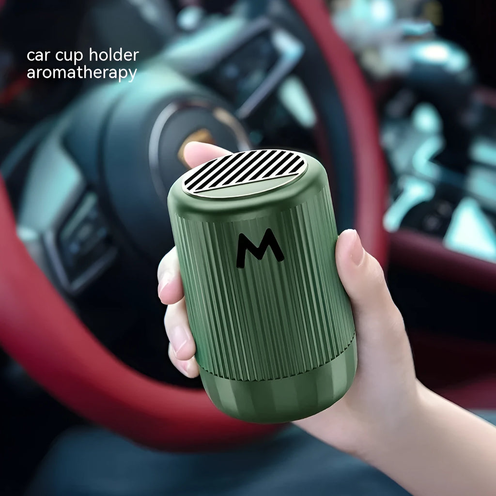 Solid car aromatherapy decoration cup measuring 10cm by 6cm in choice of four fragrances