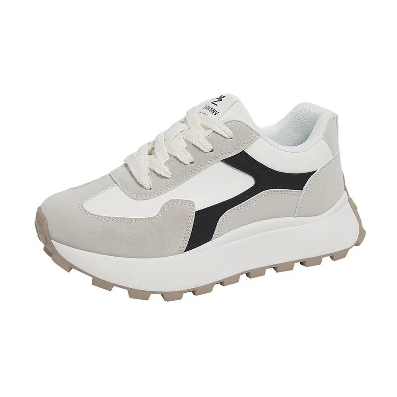 Women's solid colour low-top platform sports shoes with a rubber sole and front lace-up.