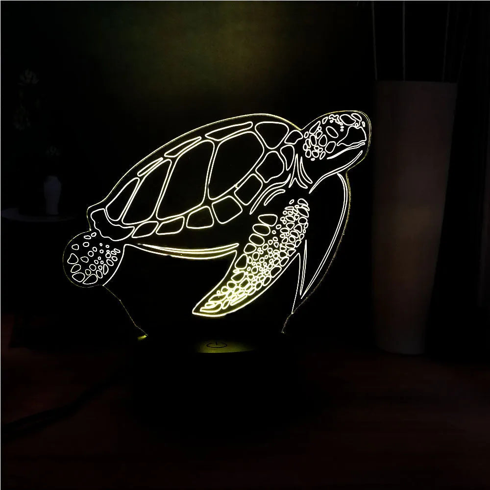 3D acrylic turtle LED night light showing colour-changing illumination and remote control