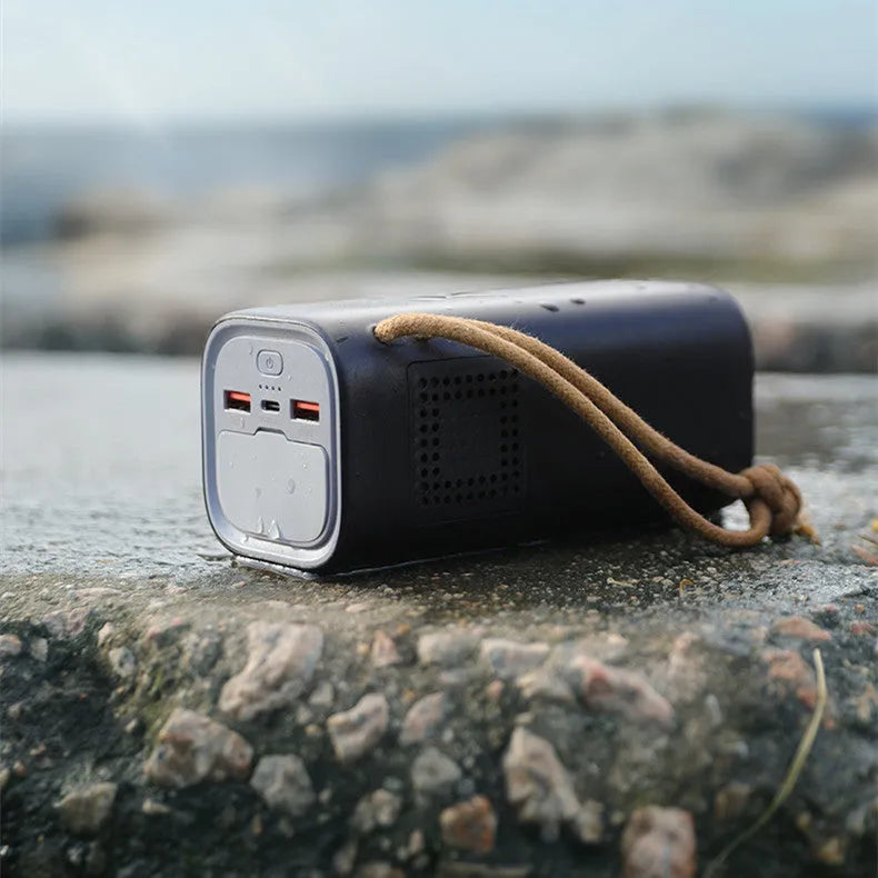 Black portable power bank with solar panel, measuring 70x70x162mm, featuring 200W output and flame retardant shell