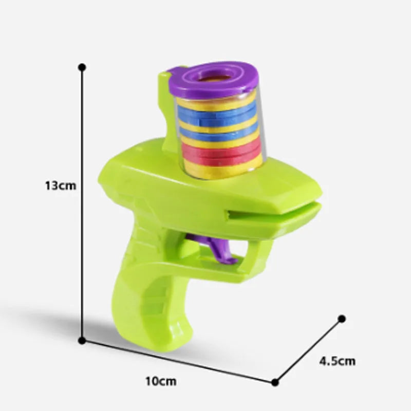 Green or purple battery-free cat toy launcher with foam disc and three foam balls