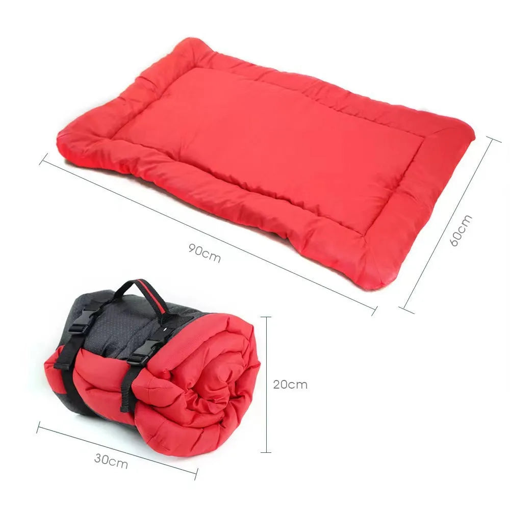 Outdoor dog bed in Blue, 90x60cm size, showing foldable design with nylon buckles on non-slip base
