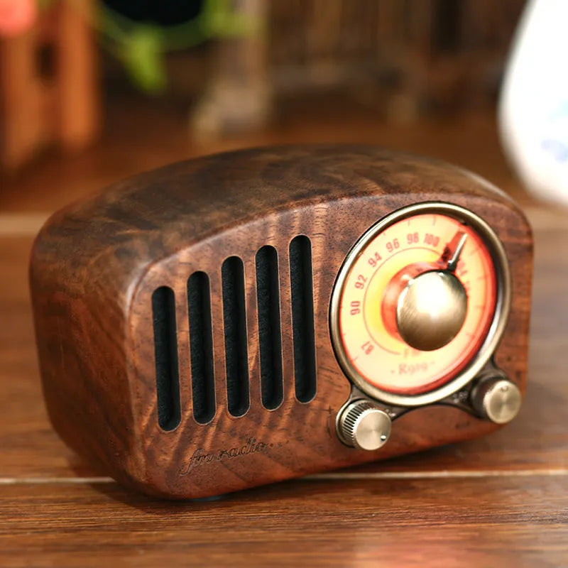 Retro wooden wireless mini speaker in cherry wood or walnut finish showing compact dimensions